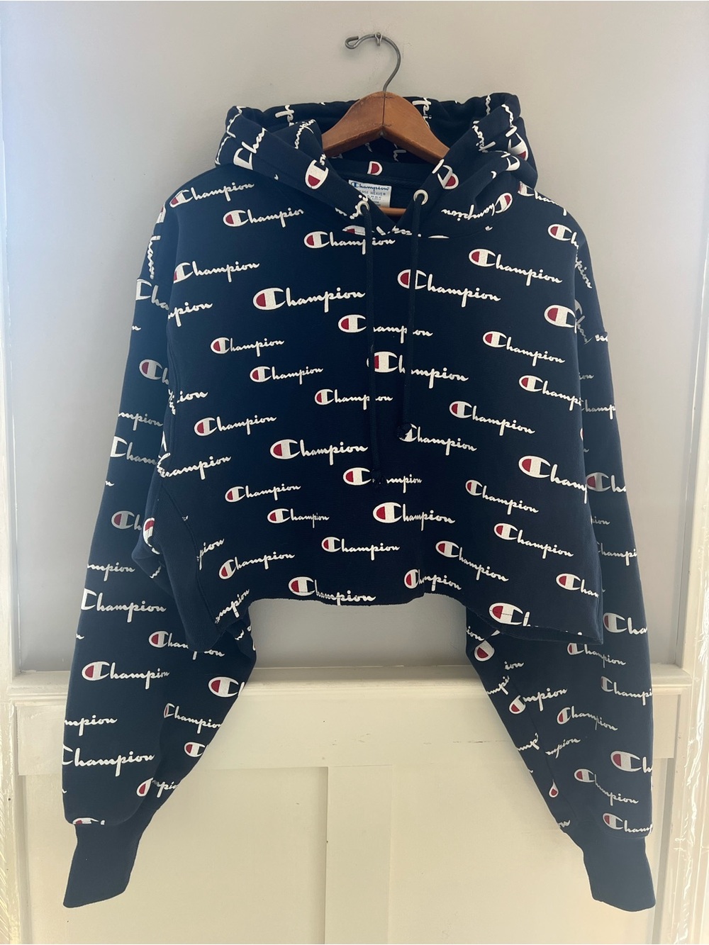 Champion Cropped  Navy All-Over Logo Hoodie with White & Red Accents